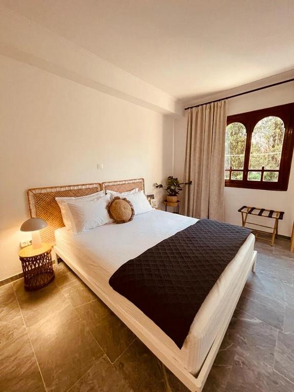 Ένα ή περισσότερα κρεβάτια σε δωμάτιο στο Noa Urban Retreat Apartment