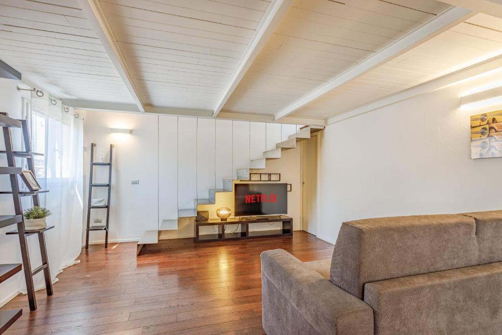 Гостиная зона в Ghirlandina Loft - In the Historic Center of Modena