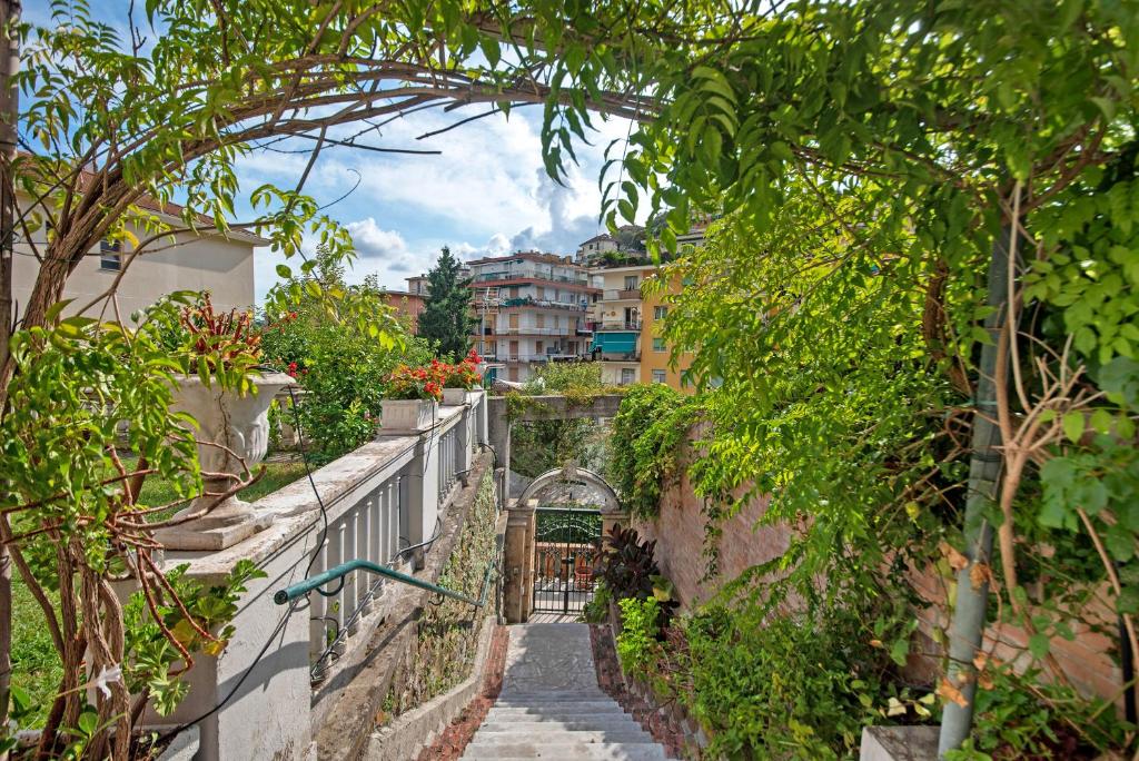 an alley way in a city with buildings at Fiordalisi in Rapallo