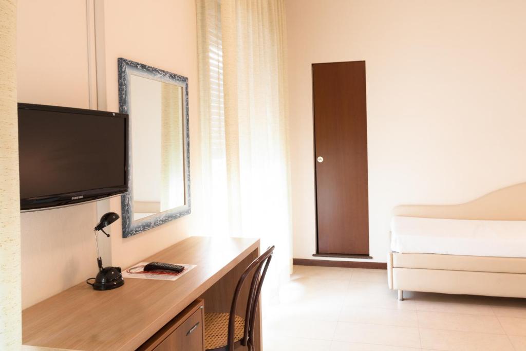 TV a/nebo společenská místnost v ubytování Hotel Metropol