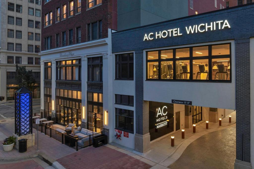 a store front of a hotel wrightia in a city at AC Hotel by Marriott Wichita Downtown in Wichita