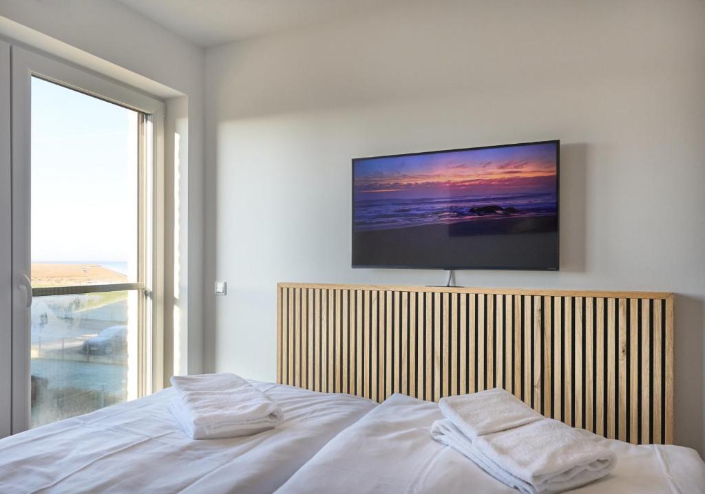 Postel nebo postele na pokoji v ubytování Zuhause In Duhnen - 312 - Steenloper