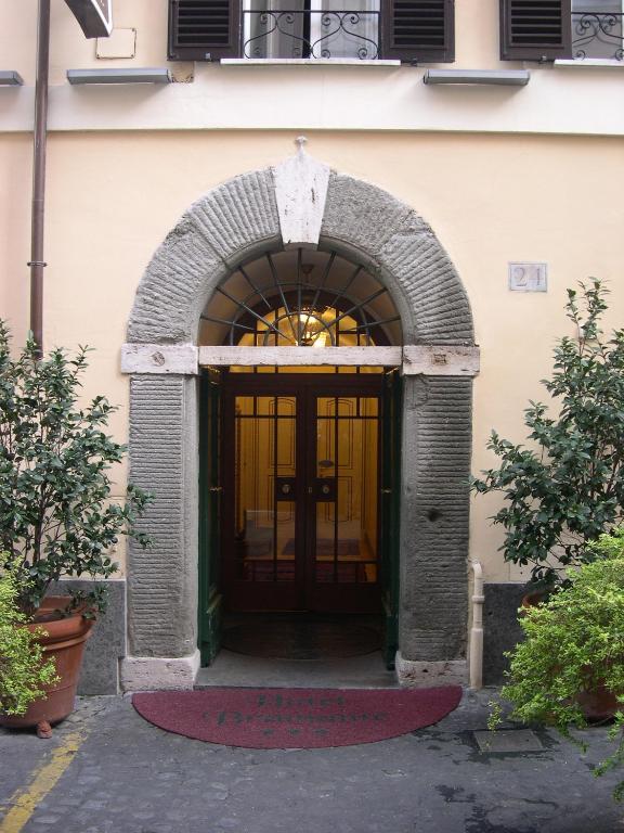 an entrance to a building with a large wooden door at Hotel Bramante in Rome