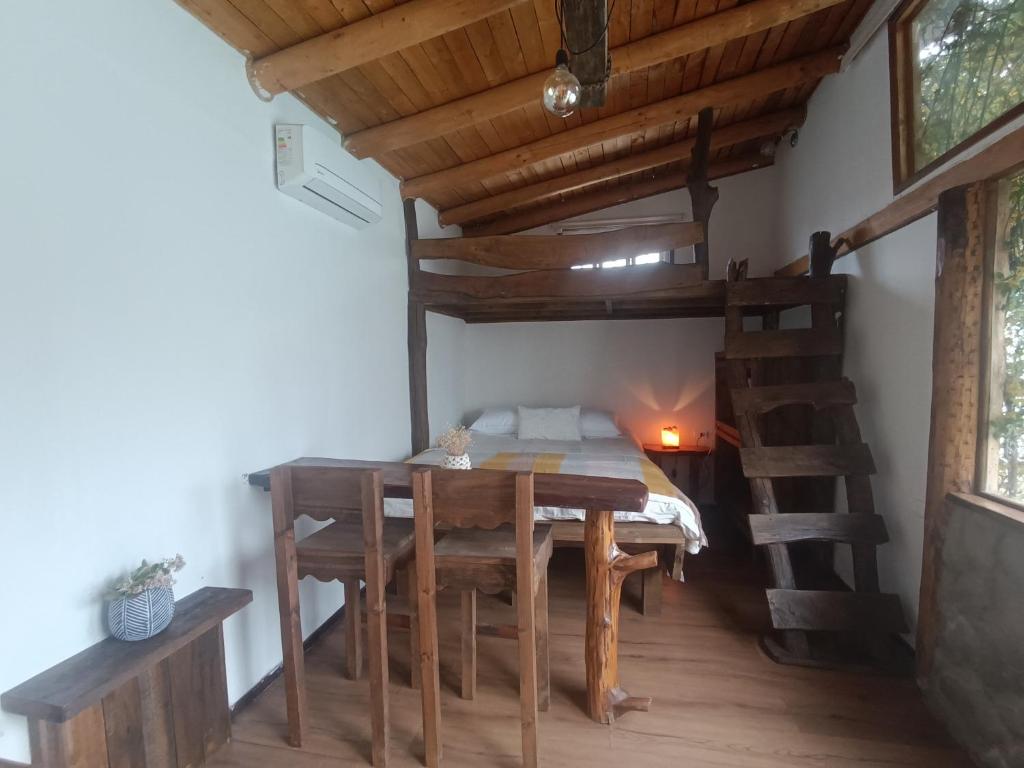 Postel nebo postele na pokoji v ubytování Refugio Capullos de Luna