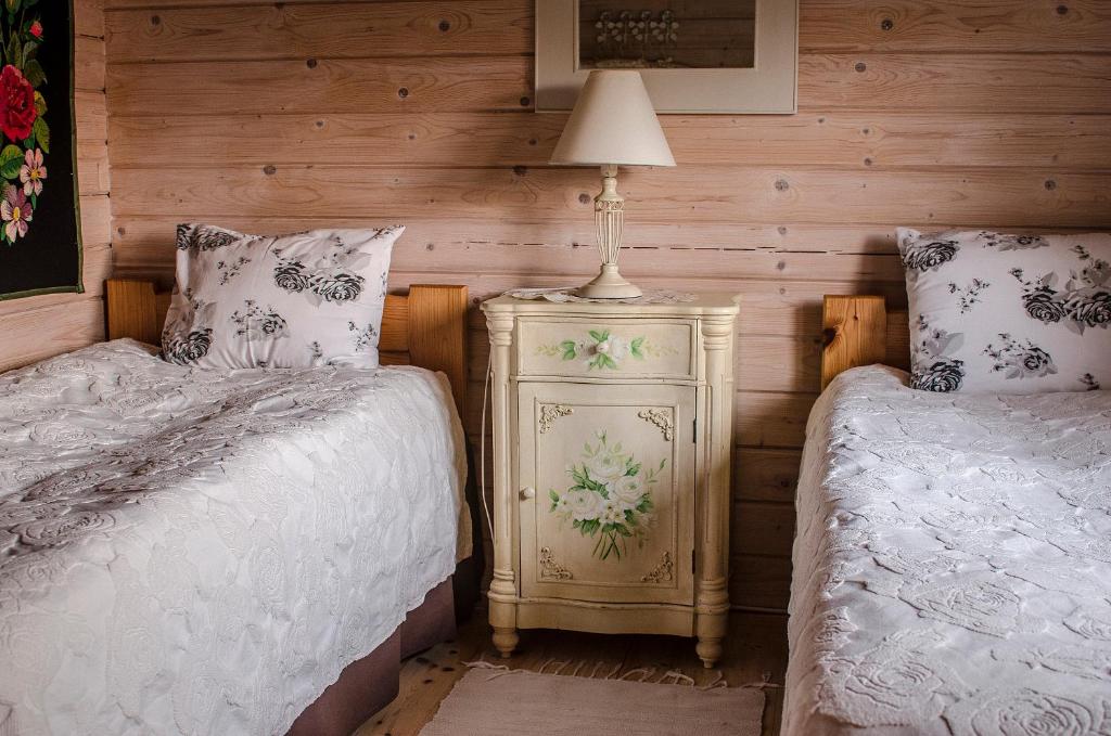 Postel nebo postele na pokoji v ubytování Västriku Holiday Home