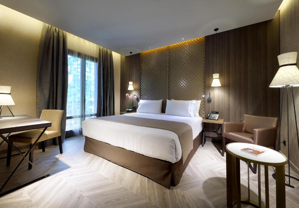 Posteľ alebo postele v izbe v ubytovaní Áurea Washington Irving by Eurostars Hotel Company