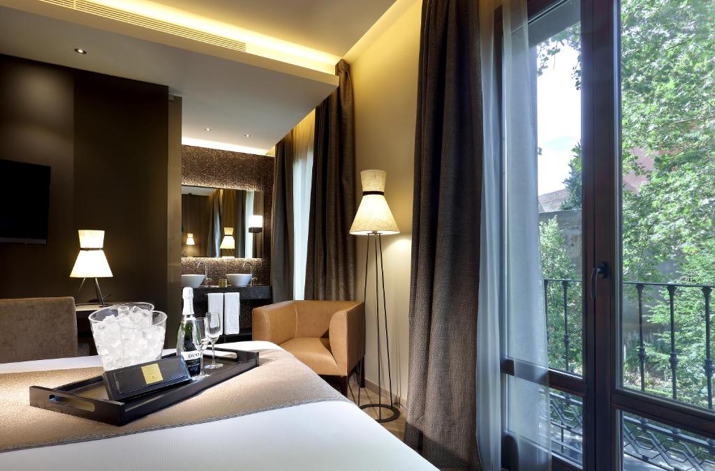 Posteľ alebo postele v izbe v ubytovaní Áurea Washington Irving by Eurostars Hotel Company