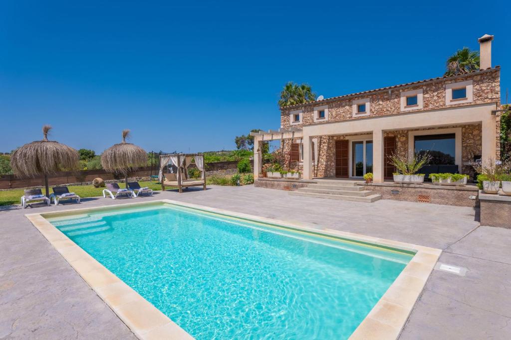 an image of a villa with a swimming pool at El Paraiso (Porto Cristo) in Porto Cristo