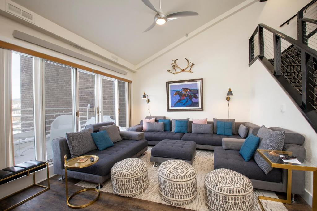 a living room with couches and a couch and chairs at Crestview Place Unit 507 in Winter Park