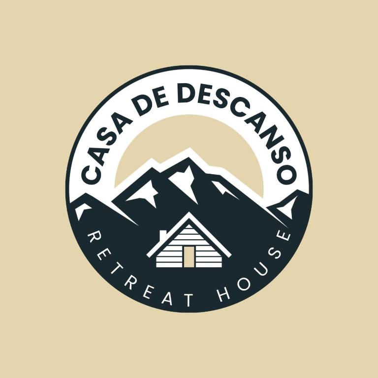 a logo for a retreat house in the mountains at Casa de Descanso in Kiawagan