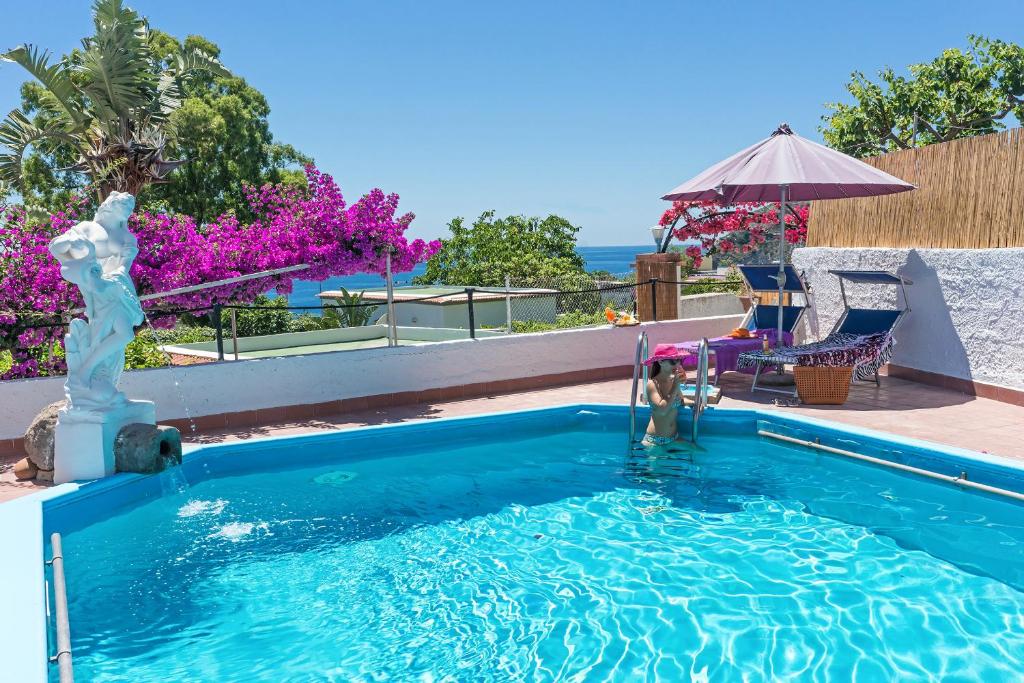 Bazén v ubytování Hotel CASA LA VIGNA nebo v jeho okolí