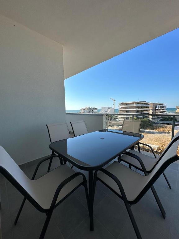 a table and chairs on a balcony with a view at Bari San Francesco Mare in Bari