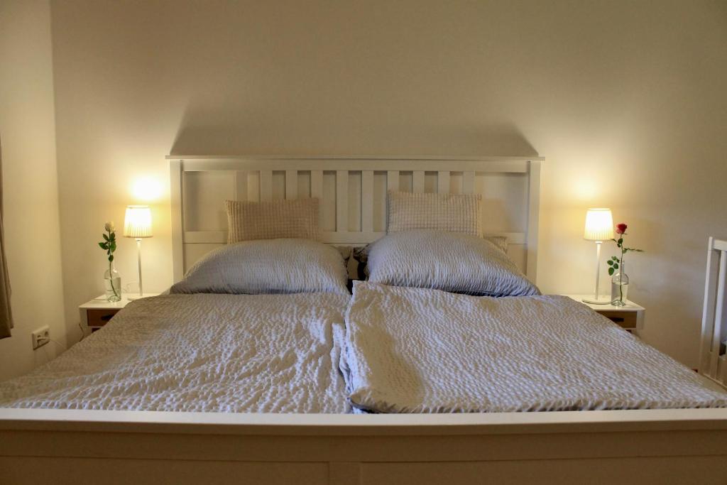 Postel nebo postele na pokoji v ubytování Ferienwohnung Waldzeit