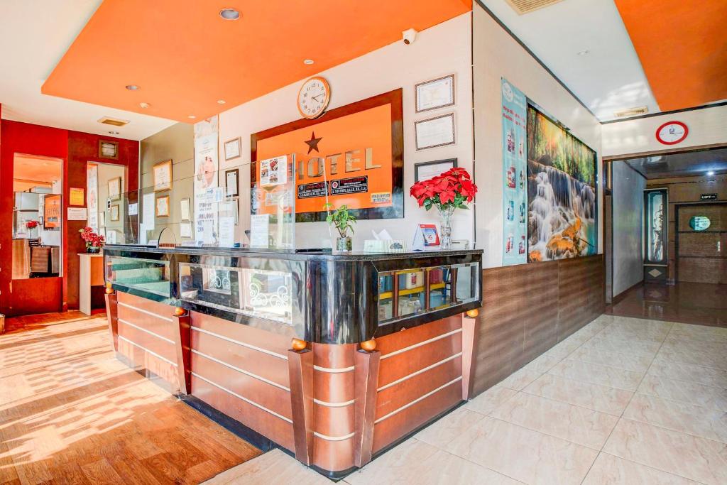 a bar in a restaurant with a counter at Dancenter S Hotel in Nagoya