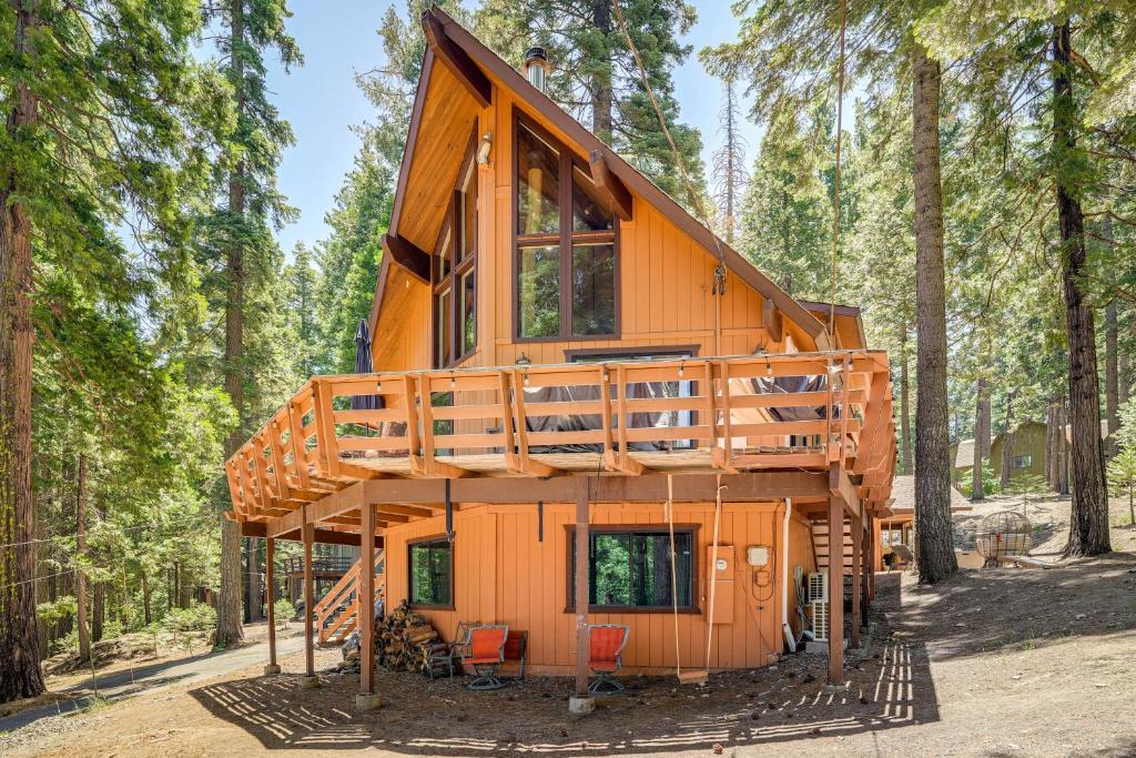 a tree house in the middle of a forest at Cabin Getaway Near Big Trees Park Game Room, Deck in Camp Connell