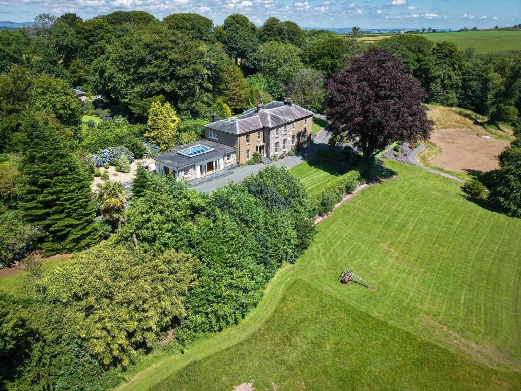 an aerial view of a large house with a yard at Cilrhiw Country House - Princes Gate in Narberth