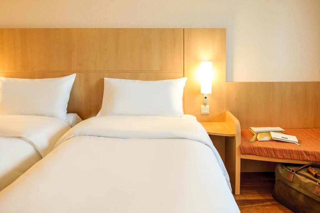Postel nebo postele na pokoji v ubytování ibis Bristol Centre