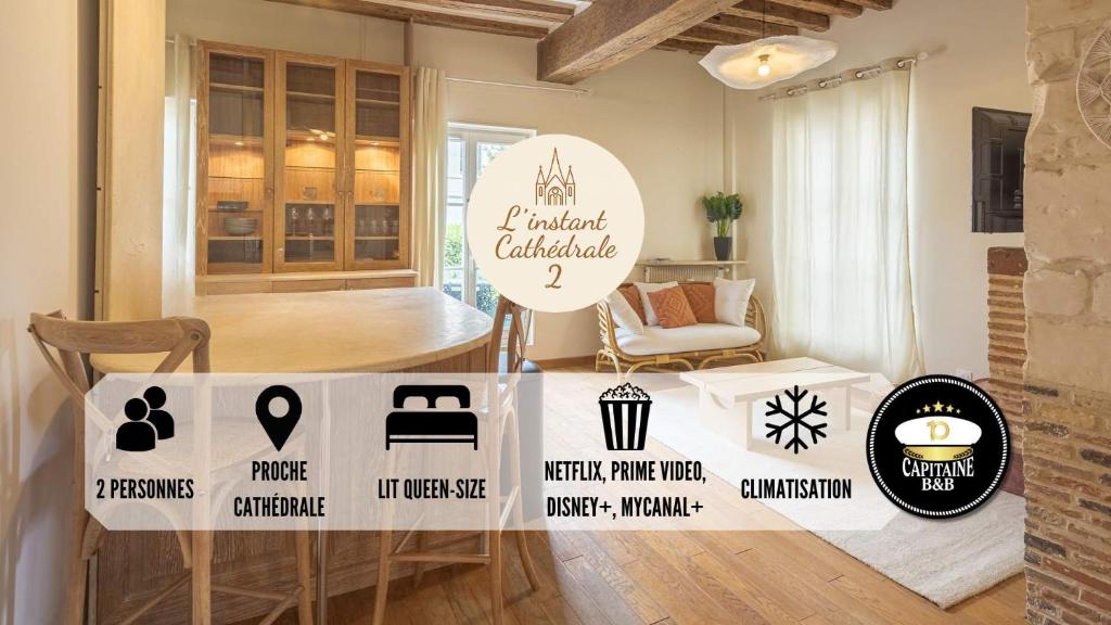 Cette chambre comprend une table avec des panneaux. dans l'établissement L'Instant Cathédrale 2 - Hypercentre - 2 pers, à Troyes