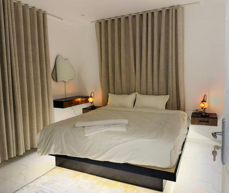 Postel nebo postele na pokoji v ubytování Beit Ahlan Suites 7