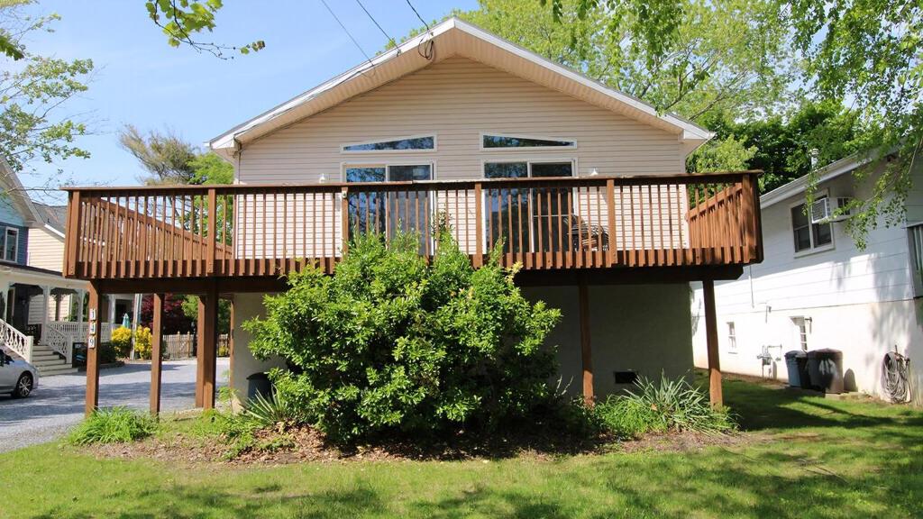a wooden deck on the side of a house at 149 Emerald Avenue in West Cape May