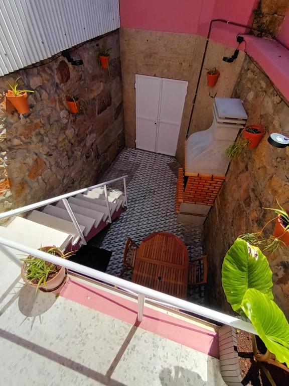 an overhead view of a room with a bed and a toilet at Apartamento Brañas in Cambados
