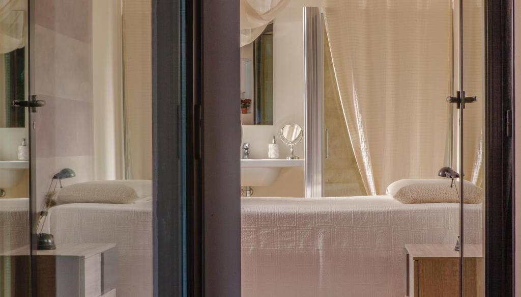 Postel nebo postele na pokoji v ubytování A Casa