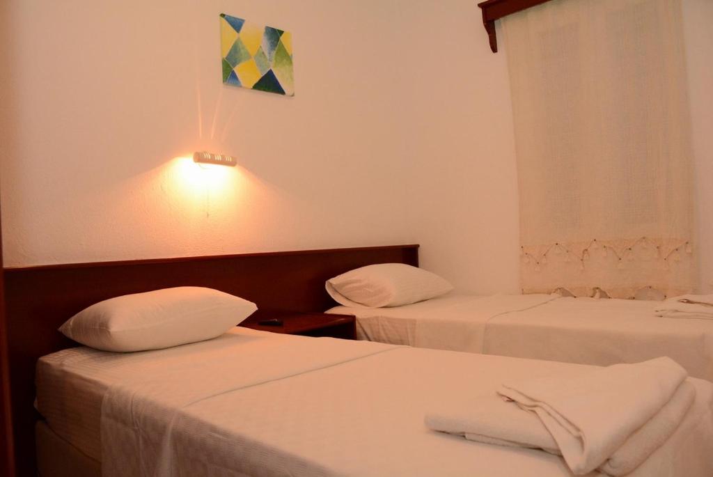 Postel nebo postele na pokoji v ubytování Villa Nergis