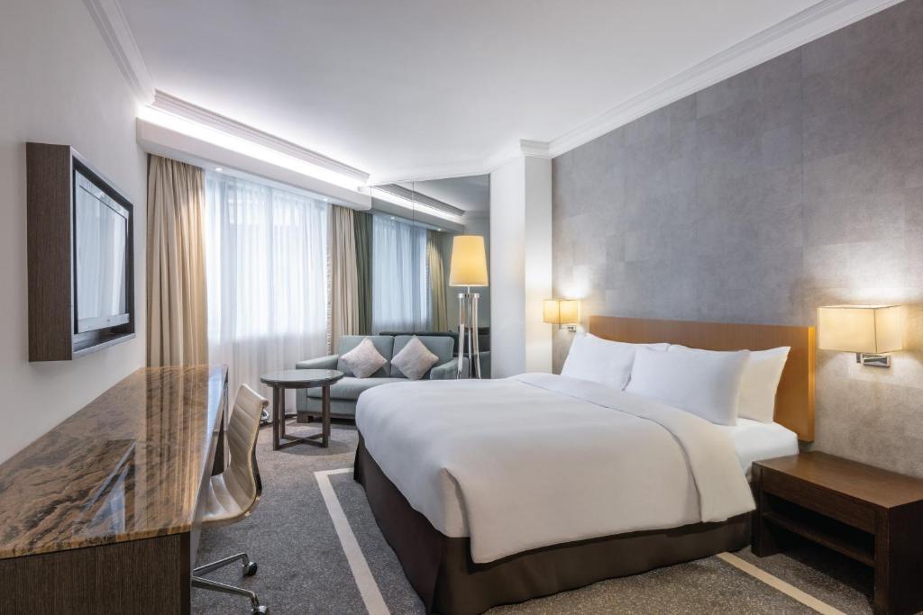 Rúm í herbergi á Gateway Hotel, Marco Polo