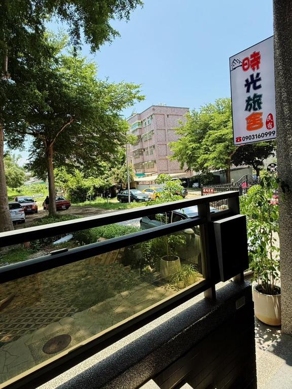 a fishtank in a window of a building at 時光旅舍 in Jincheng
