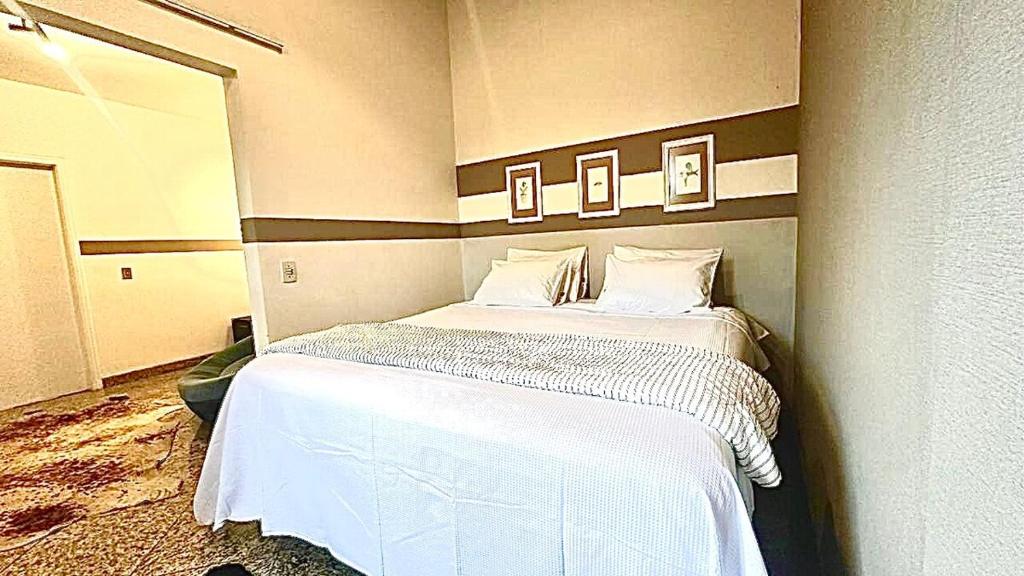 En eller flere senge i et værelse på Sonho do Moreno