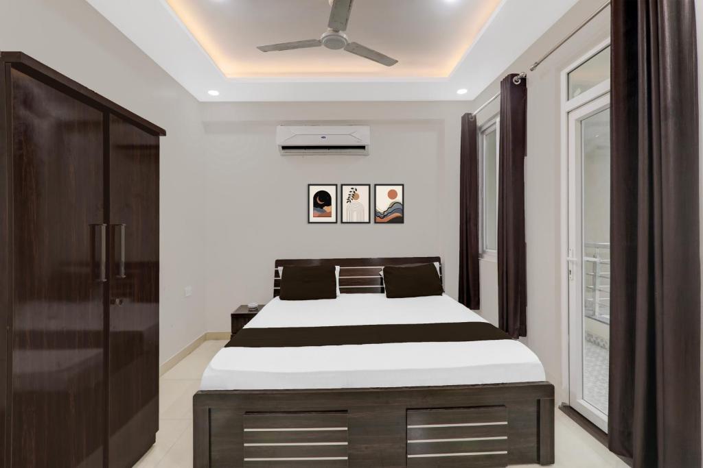 Katil atau katil-katil dalam bilik di HOTEL O Raghav Vaidehi Inn