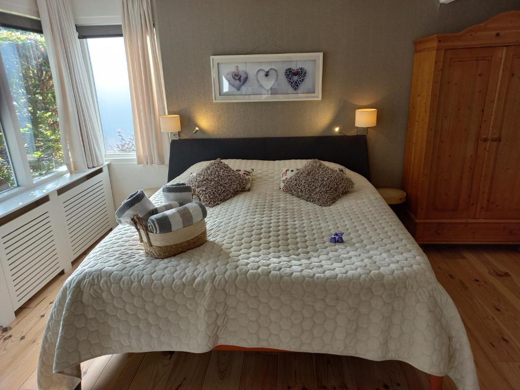 Postel nebo postele na pokoji v ubytování Bed and Breakfast Hattem