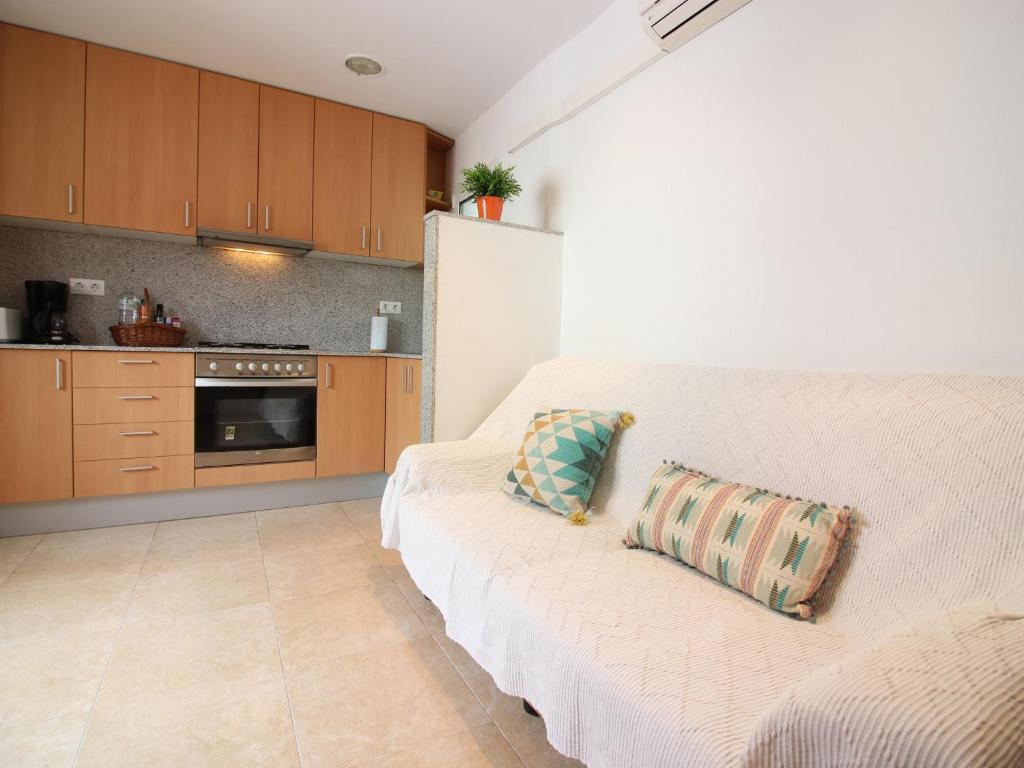 Appartement central à Roses, à 300m de la plage avec terrasse solarium et climatisation