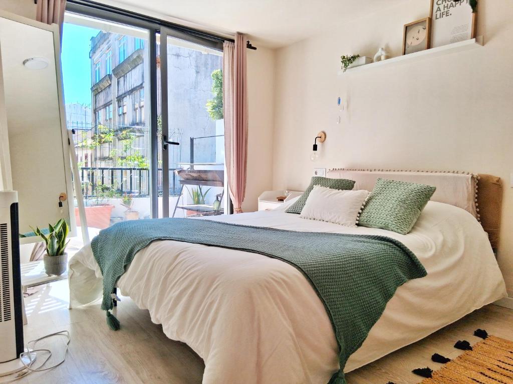 Postel nebo postele na pokoji v ubytování Apartamento con terraza, centro histórico de Noia
