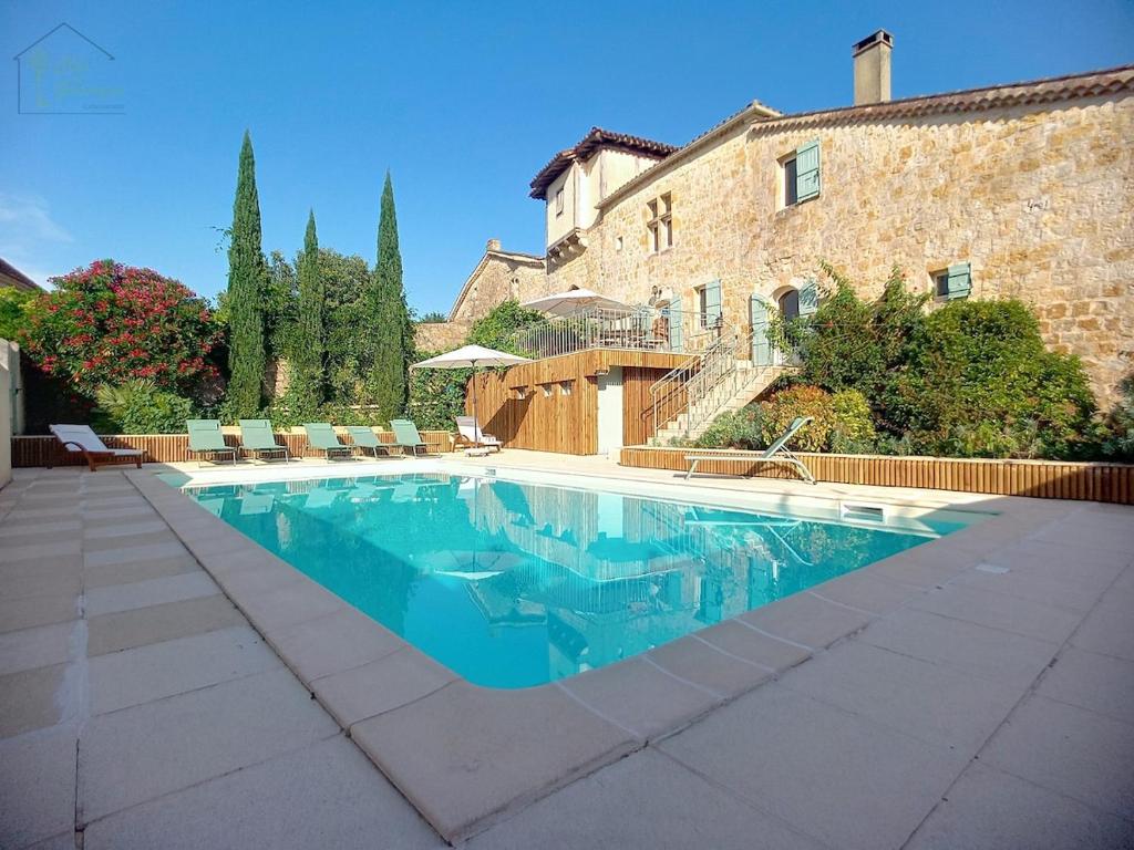 Πισίνα στο ή κοντά στο Maison du Porche 4 étoiles, piscine, 10 voyageurs