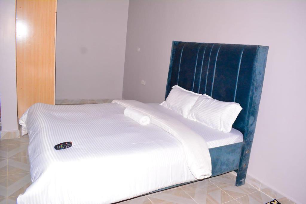 Ένα ή περισσότερα κρεβάτια σε δωμάτιο στο Imani apartment