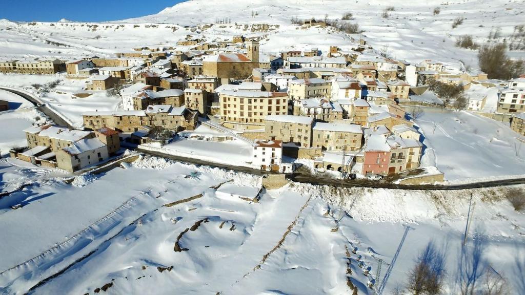 an aerial view of a city covered in snow at Casa Senderuela by CARDI Suites in Valdelinares