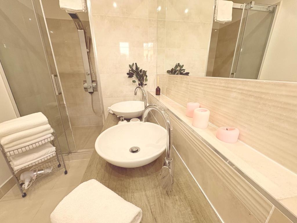 Koupelna v ubytování Trio Apartments