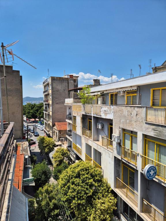 an overhead view of a city street with buildings at Urban Roof Studio in Kavala