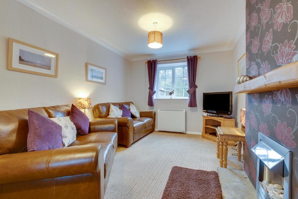 Et opholdsområde på Smugglers Cove Cottage