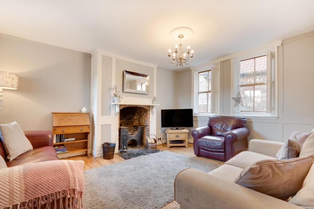 Posezení v ubytování Ducks Cottage