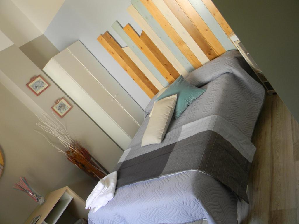 Postel nebo postele na pokoji v ubytování B&B Melanella