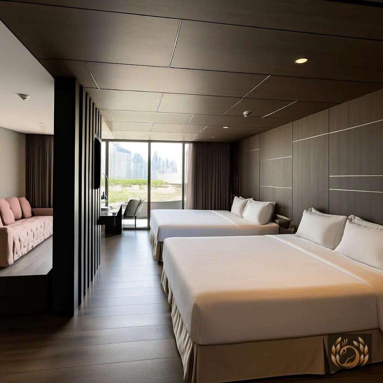 Giường trong phòng chung tại Kim Thanh Boutique Hotel Nha Trang