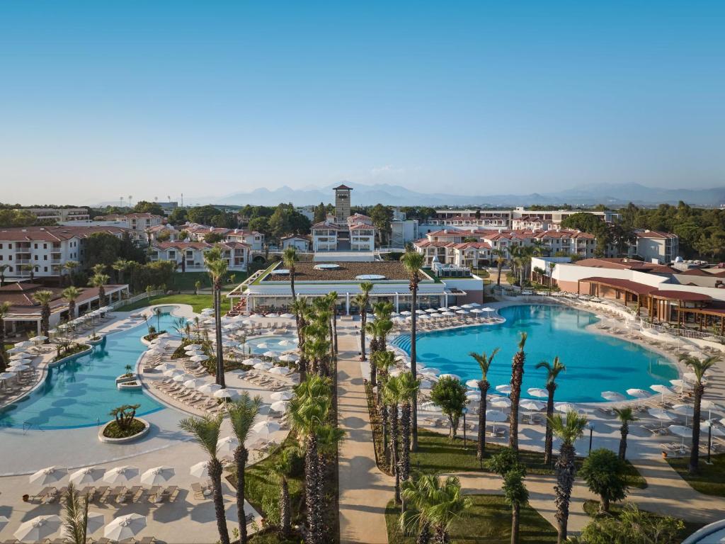 an aerial view of a resort with a pool at Paloma Grida in Belek