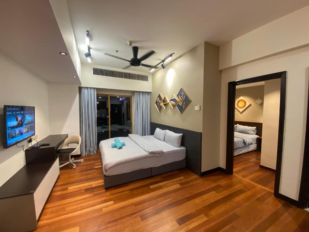 Postel nebo postele na pokoji v ubytování Sunway Resort Suite direct access to Mall & Lagoon