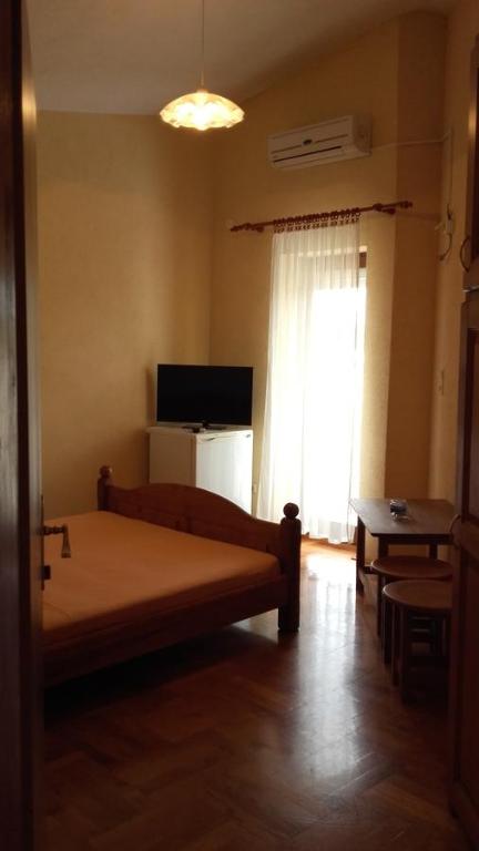 A bed or beds in a room at Villa Mateja