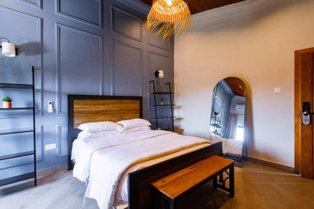 Postel nebo postele na pokoji v ubytování Pink House Boutique Hotel