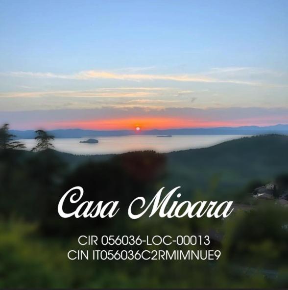 a picture of a sunset over the water at casa mioara in Montefiascone