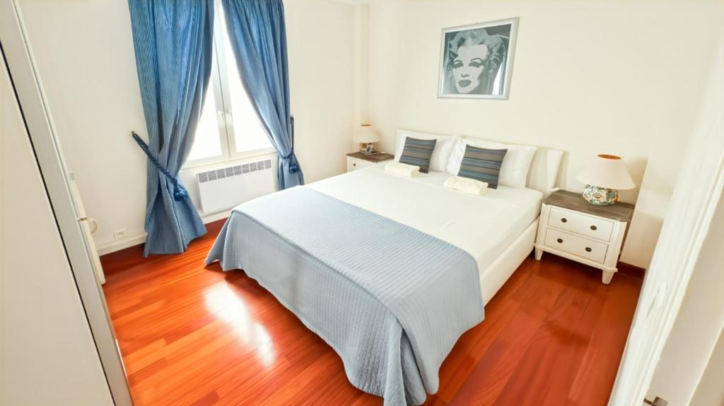 Postelja oz. postelje v sobi nastanitve Monte Carlo Central Suite Rickeys