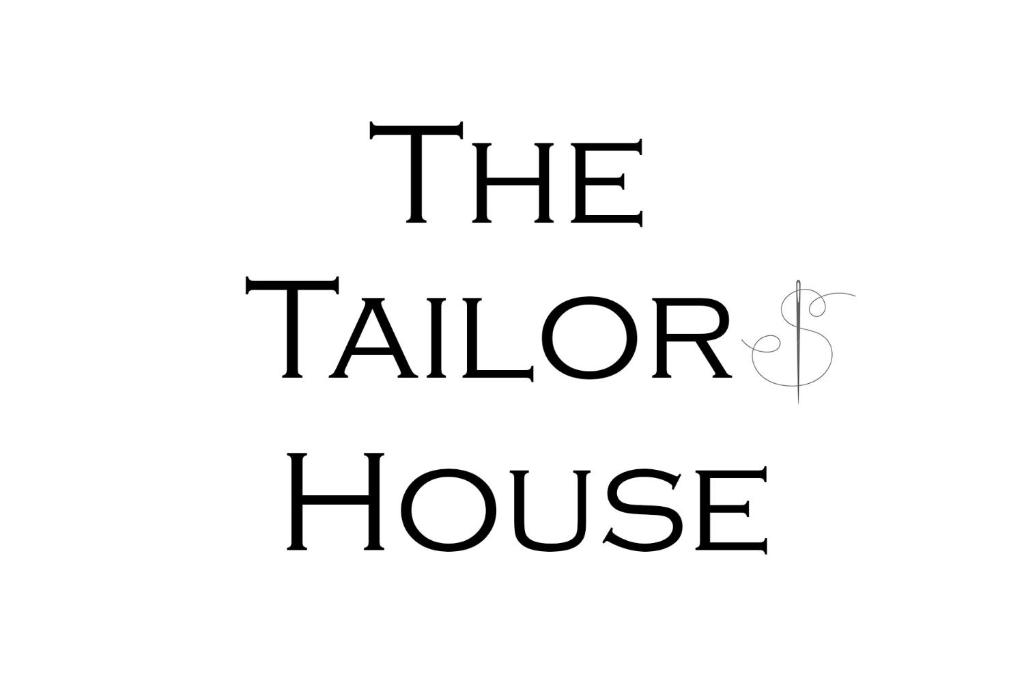 Certificado, premio, señal o documento que está expuesto en The Tailor's House